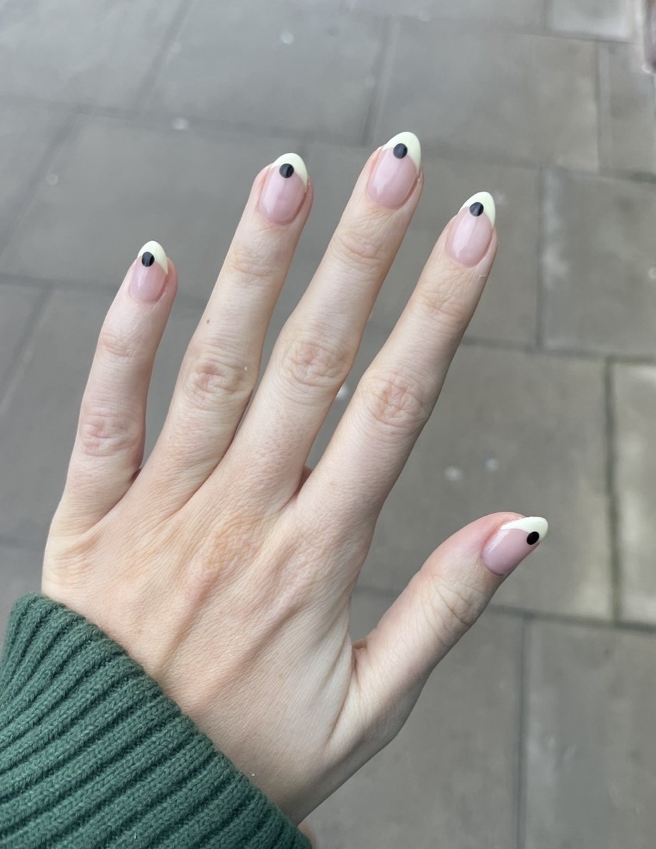 Minimalist nude nails with pale yellow tips